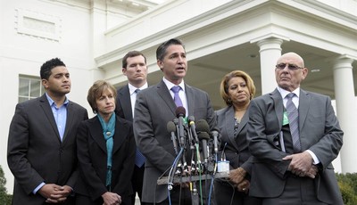 
              Dan Gross, President of the Brady Campaign to Prevent Gun Violence, center, speaks outside the White House in Washington, Wednesday, Jan. 9, 2013, following a meeting with Vice Presiden